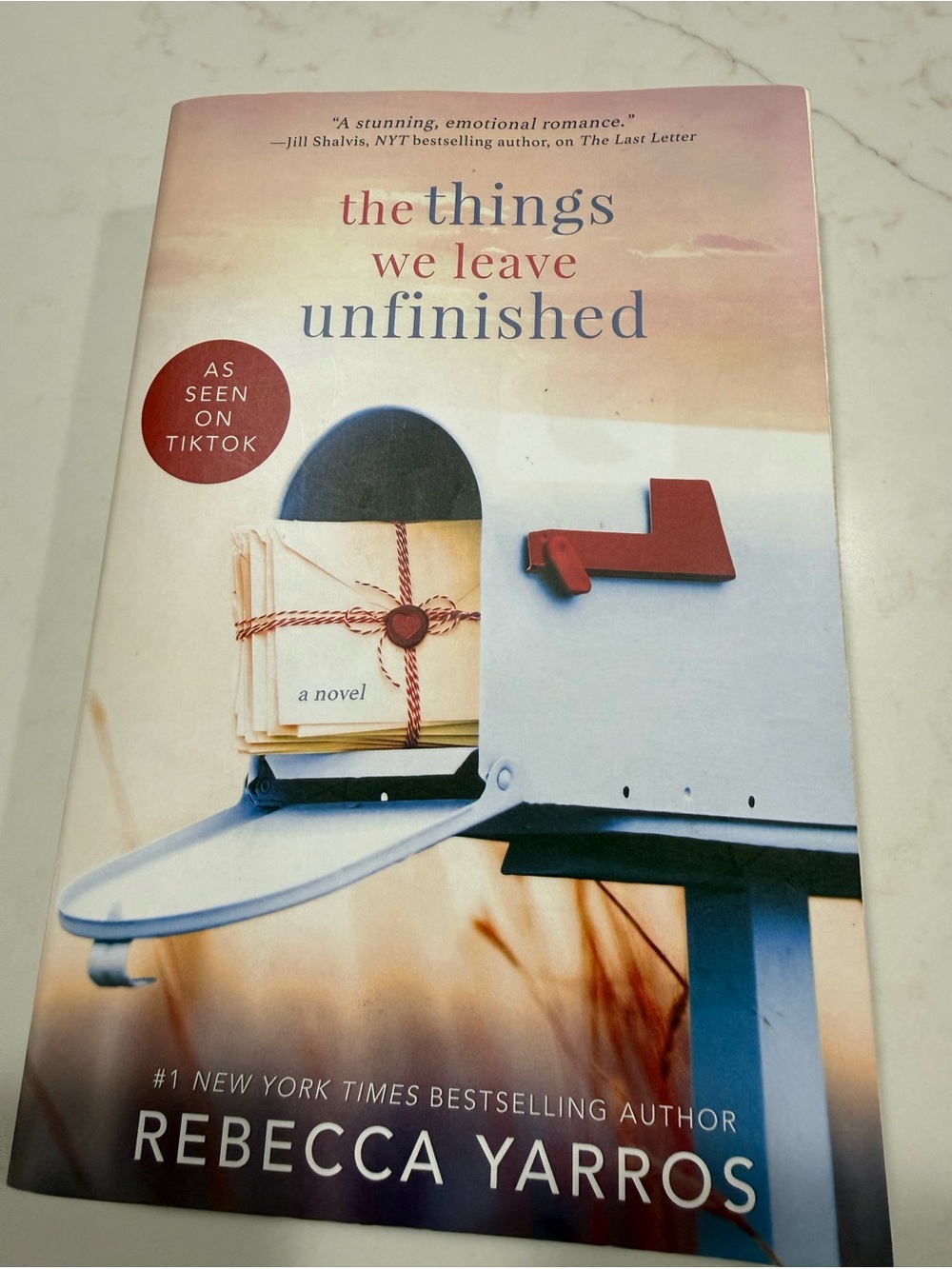 The Things We Leave Unfinished • Rebecca Yarros Paperback Book